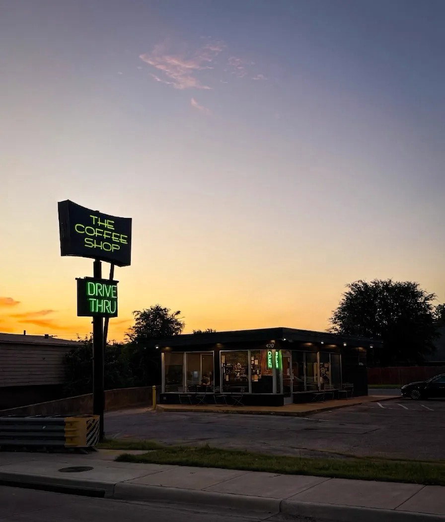 The Coffee Shop's neon sign and drive-thru sign at 420 W Pipeline Rd.